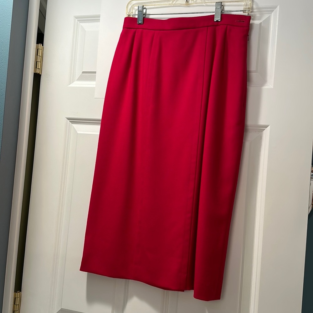 Dark pink Jaeger skirt. Made in Great Britain. Waist is 14.25 inches